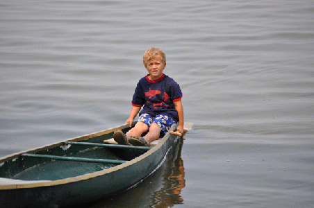 Boy in Canoe